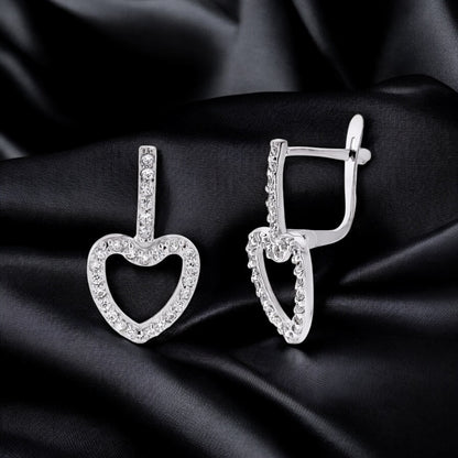 9k pendientes oro blanco dos cuerpos corazón circonita 20×10 mm cierre catalán