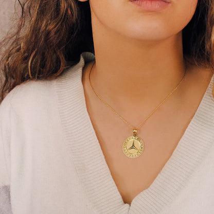 Medalla oro amarillo estrella tres puntas con borde de greca calada. 18k 27 mm